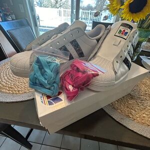 These are women’s Adidas superstars. Worn twice.